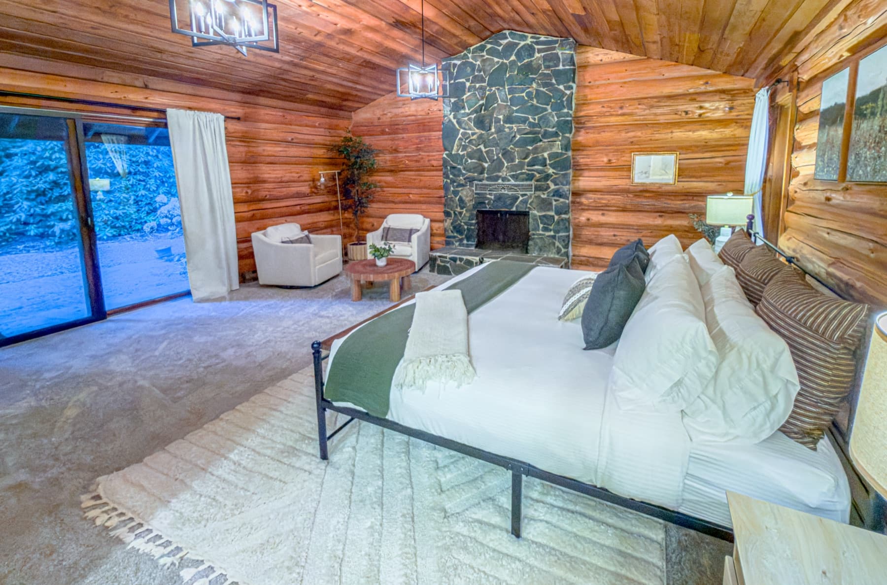 Master suite — king bed, fireplace, private deck